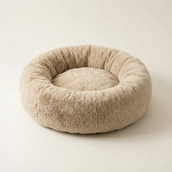 Round oatmeal faux-fur donut pet bed with a raised rim